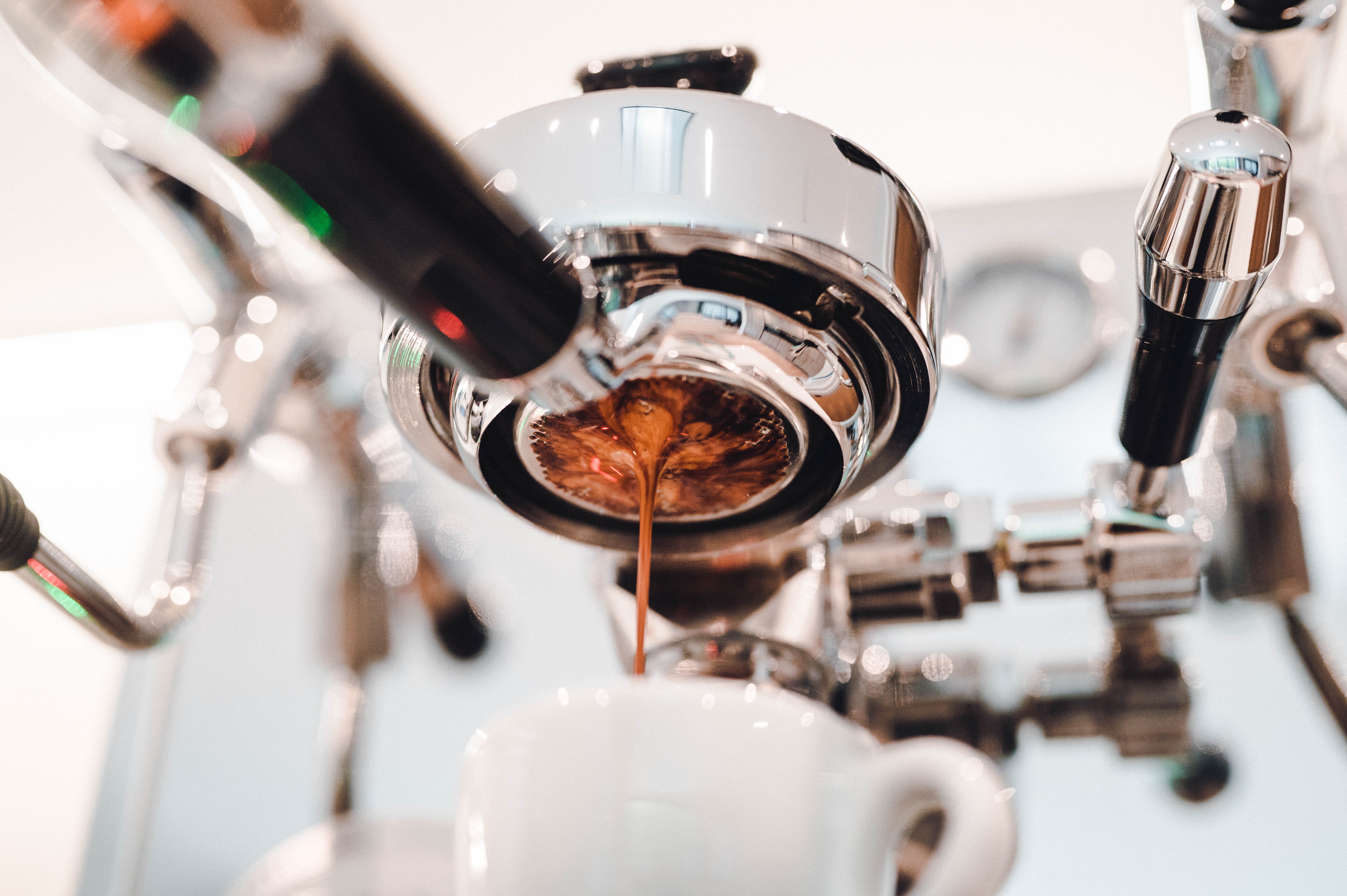 Coffee extraction off of an espresso machine creating crema